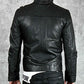 Black leather jacket worn by a person on a gray background