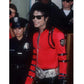 Person wearing a red jacket with black accents and sunglasses, standing in front of police officers.
